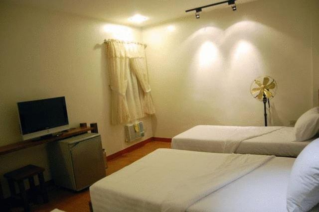 Ilocos Rosewell Hotel Kamer foto